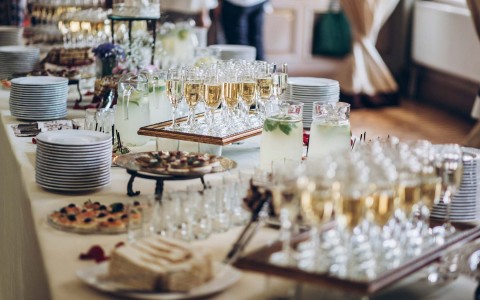 brunch buffet with champagne and small pasteries