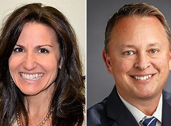 two business people smiling
