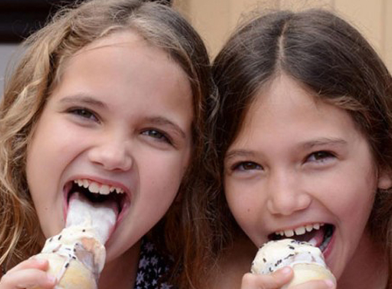 two kids eating ice cream