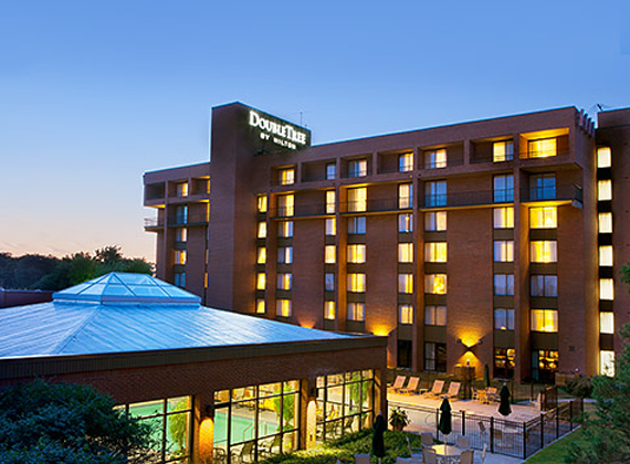 the exterior of a hotel at dusk