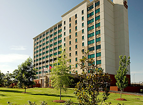the exterior of a hotel during the day