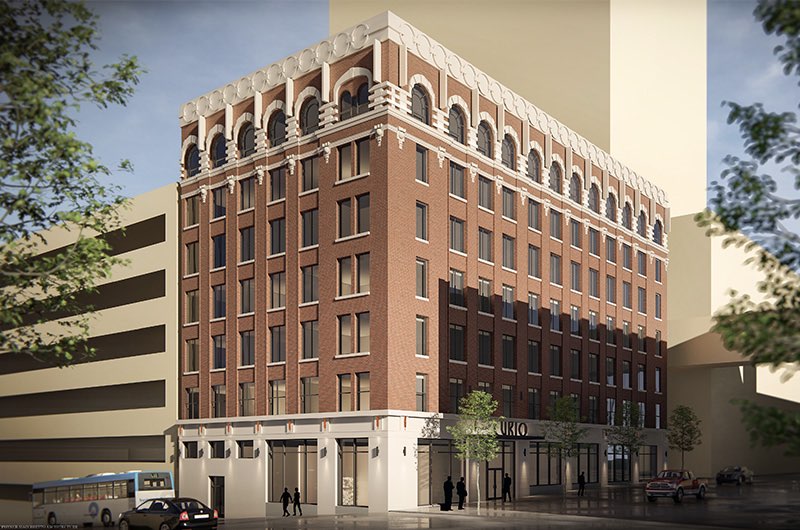 the exterior of a curio hotel