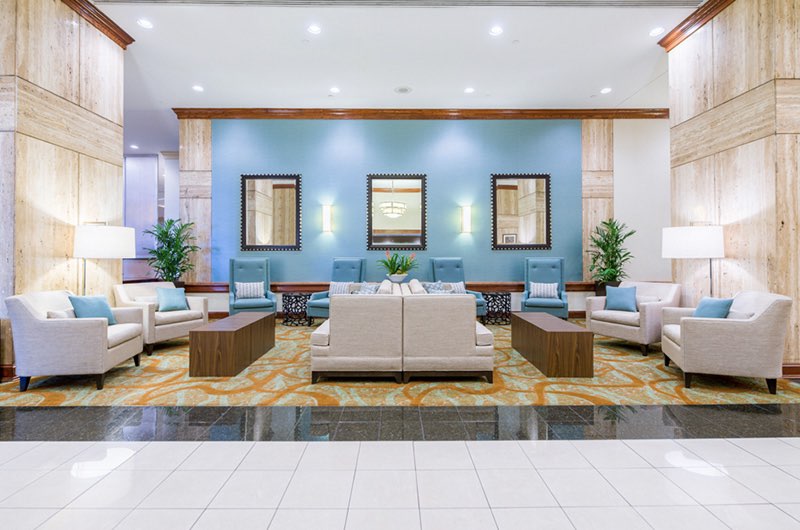 the lobby inside of an airport hotel