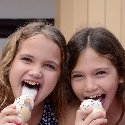 two girls eating ice cream