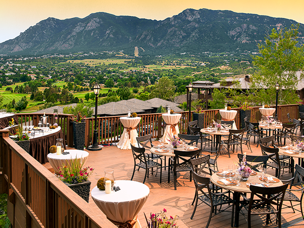 View of a wedding venue outdoors and a large mountain in the background
