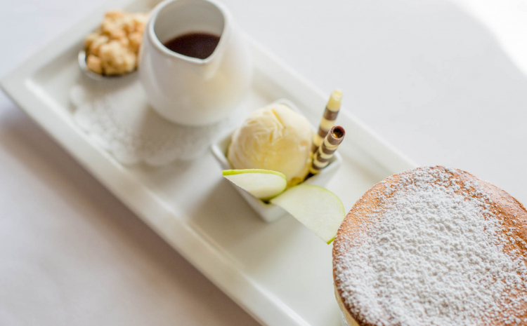White plate with coffee, ice cream & pastry 