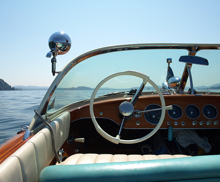 vintage boat cruising on the water