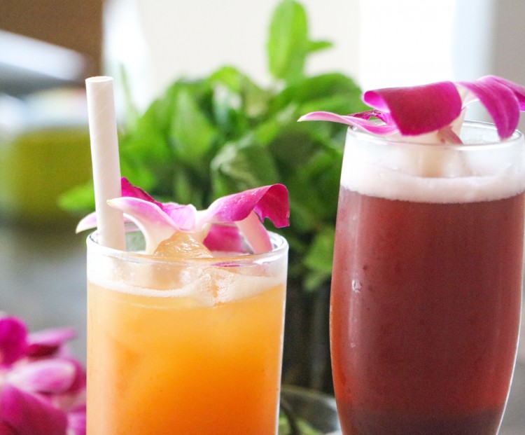 sangria and rum punch cocktails garnished with flowers