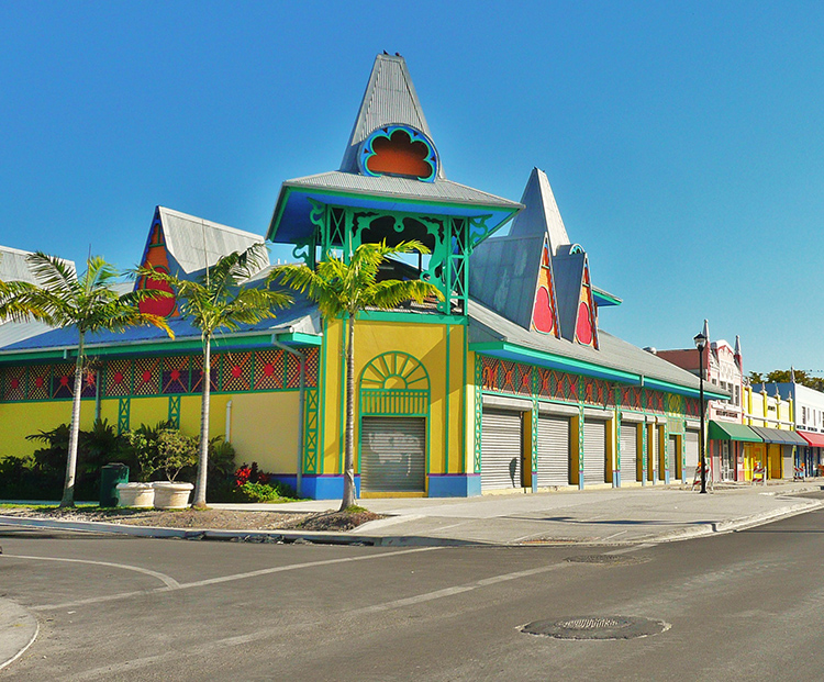 little haiti street in miami of a yellow and red building