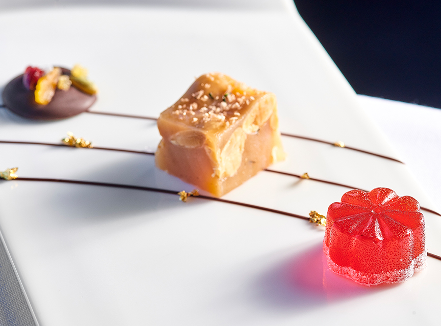 3 small desserts on a plate