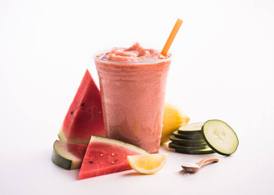 Jamba Juice smoothie with watermelon & sliced cucumber
