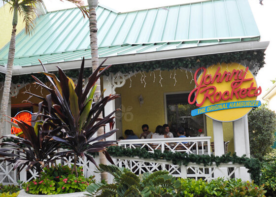 Johnny Rockets entrance with outdoor seating on porch