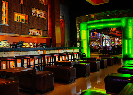 Nobu dining with neon orange & green lights
