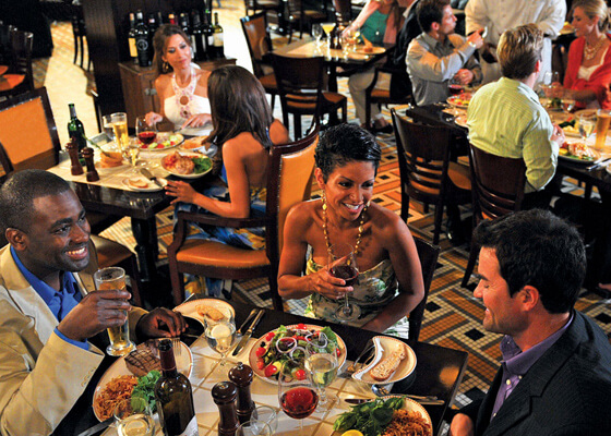 Image from above of friends dining at Seafire Stakehouse