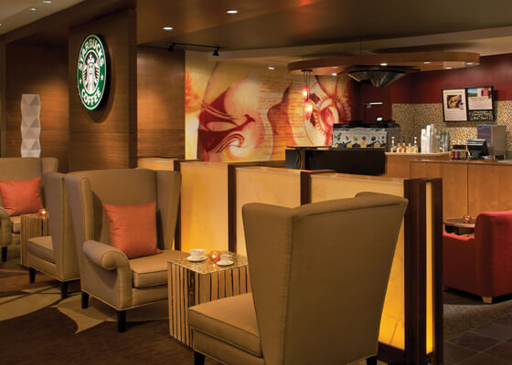 Starbucks with warm decor & lighting