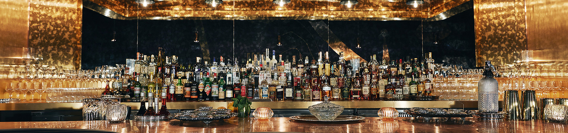 liquor collection behind a bar