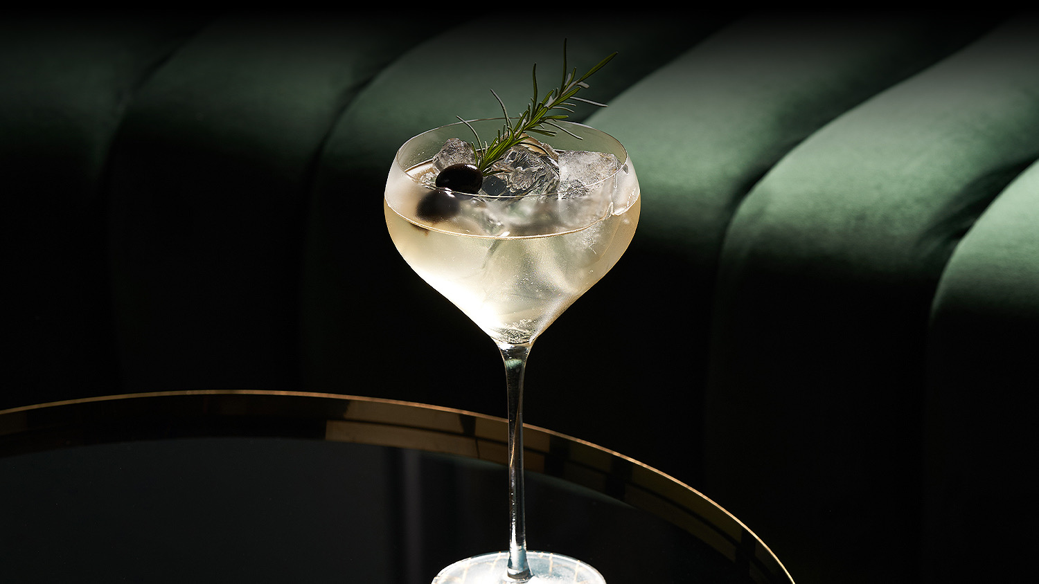 single elegant coupe glass with a cocktailq