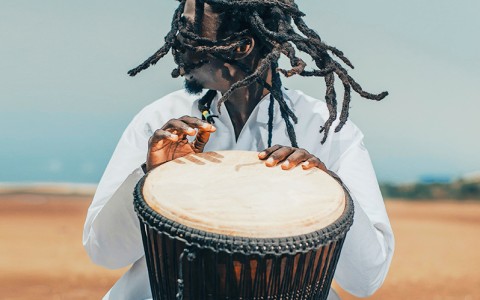 man playing a drum