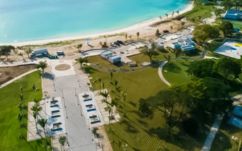 harmony beach park aerial shot during the day with a large blue lagoon