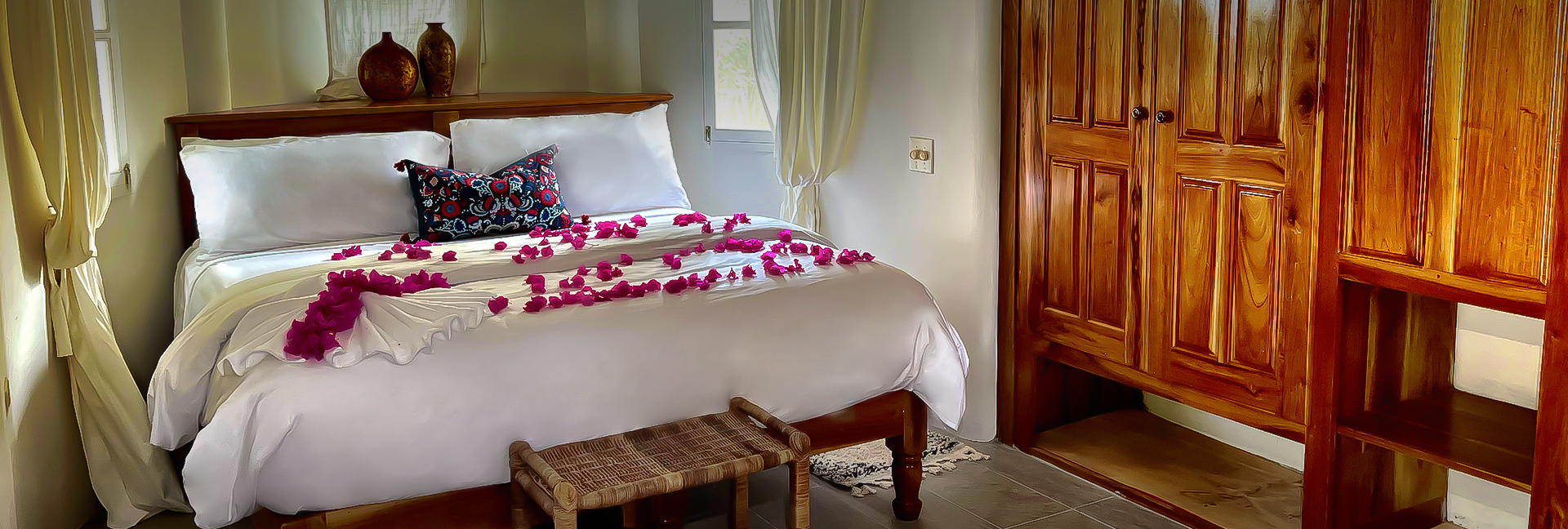 flower petals spread over a bed