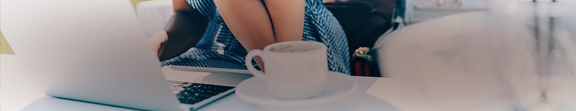 woman on the computer with coffee