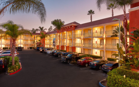 Exterior of hotel and parking lot
