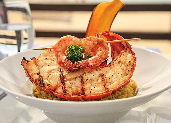 lobster in a bowl full of rice
