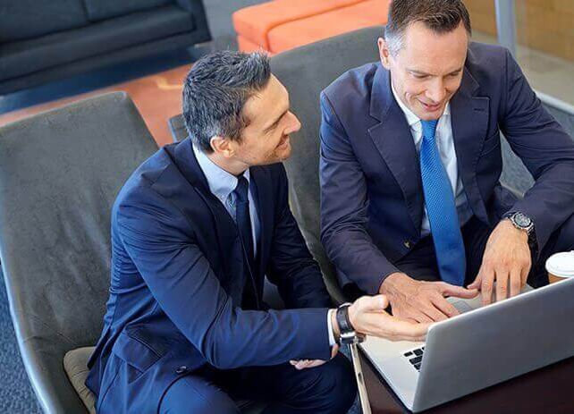 men talking during a business meeting