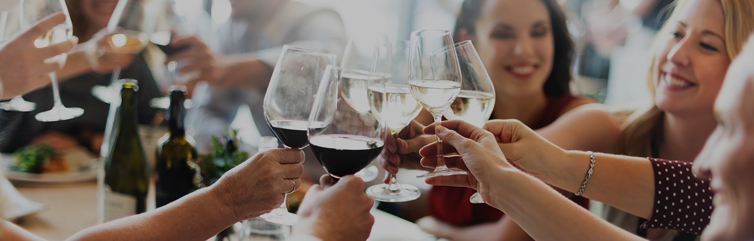 group of friends cheering with glasses