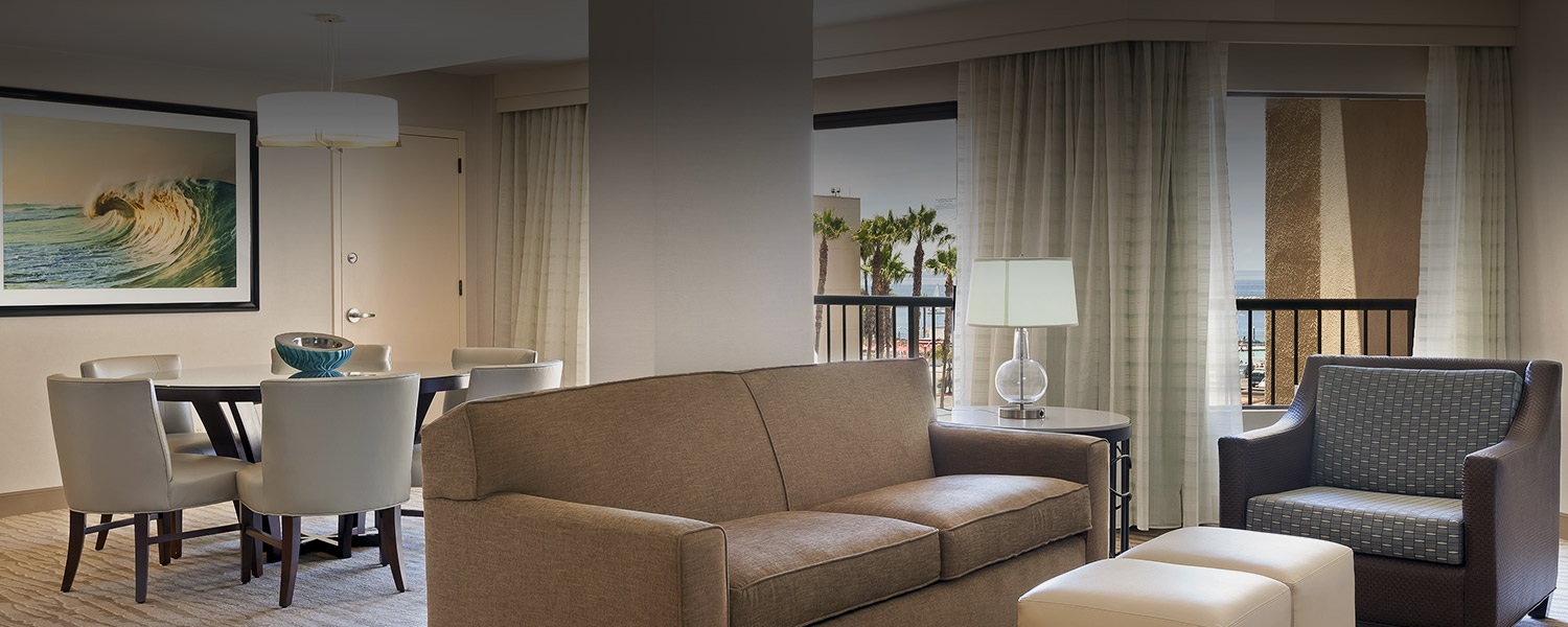 a guest room with a sitting area