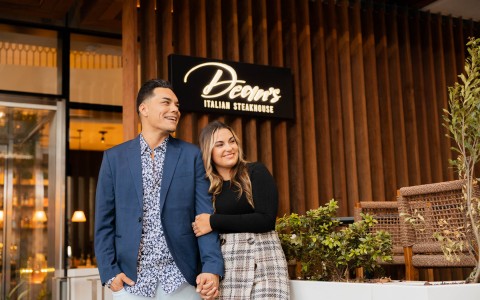 couple in front of deans restaurant 