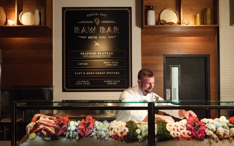 raw bar with chef and seafood 