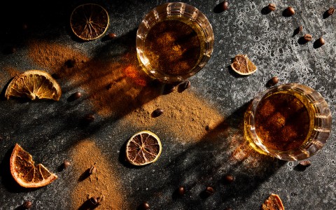 top view of two drinks and dried fruit
