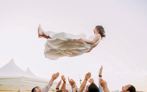 bride tossed up in the air