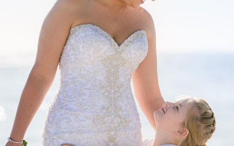 bride and child hugging