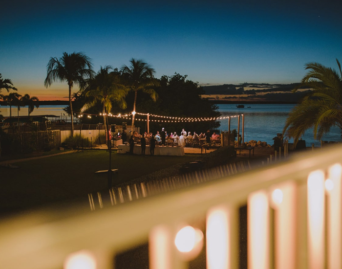 view of a wedding reception seen from a distance at night
