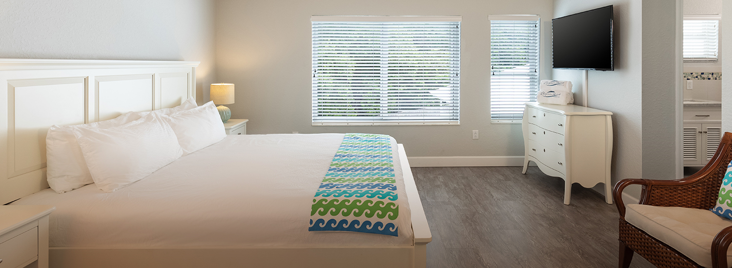 room with bed and white bedframe