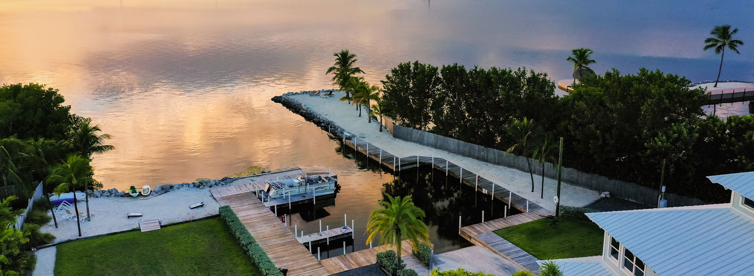 view of marina at sunset