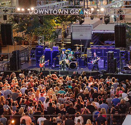 dowtown grand hotel & casino concert venue with people enjoying it