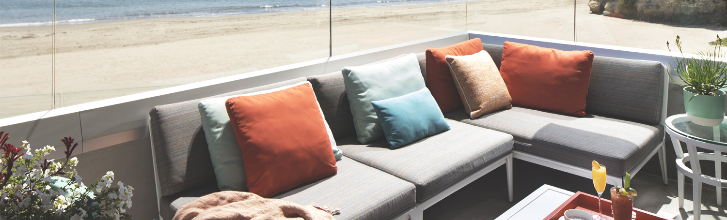 sectional couch room with beach view on the outdoor patio