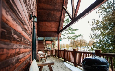 balcony of a lodge with snow on it