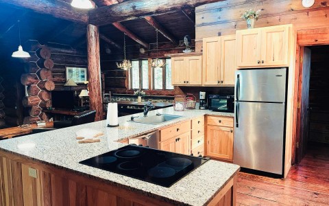 large kitchen island and counter in cabin accommodations