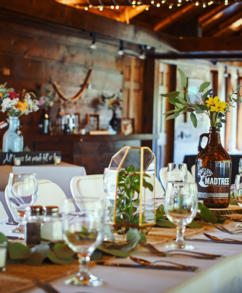 A barn decorated for a pretty wedding