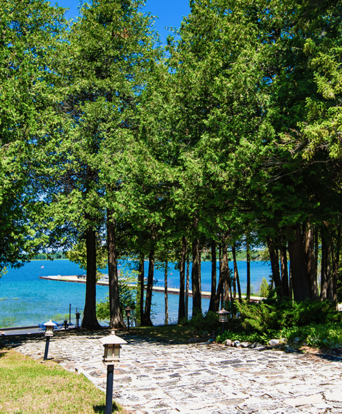 view of a stone path leading to the ocean