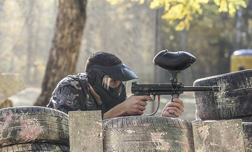 View of a man playing paintball