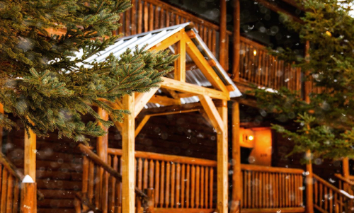 Wood cabin in the snow