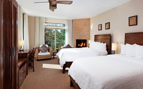 A big room with two double king beds