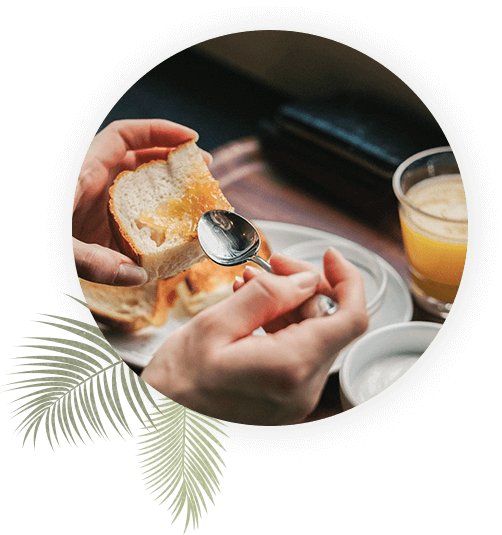woman putting jelly on her toast