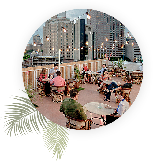 people eating on the rooftop terrace