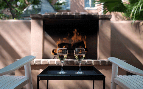 elliott house fireplace with two wine cups